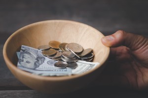how do I tithe when I'm in debt?